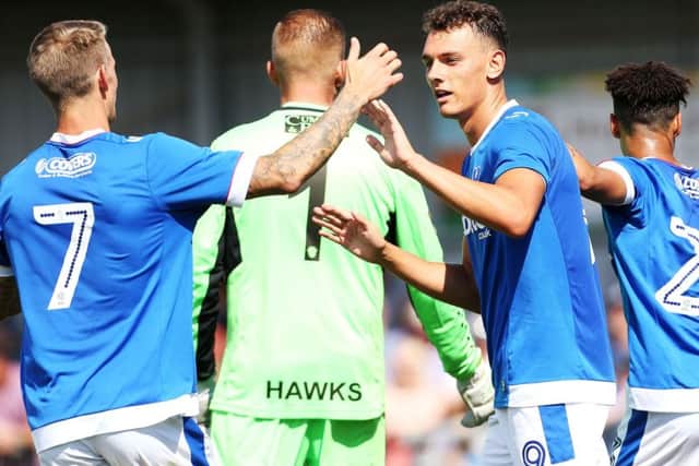 Kal Naismith, right, celebrates his goal with Carl Baker Picture: Joe Pepler PPP-170807-170853006