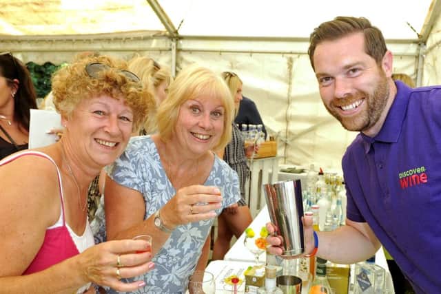 07/07/17 BF
The Denmead Gin Festival. (left to right), Ann Ozouf, Angela Roystone and Russell Pert.
Picture Ian Hargreaves (170756-1) PPP-170907-130404006