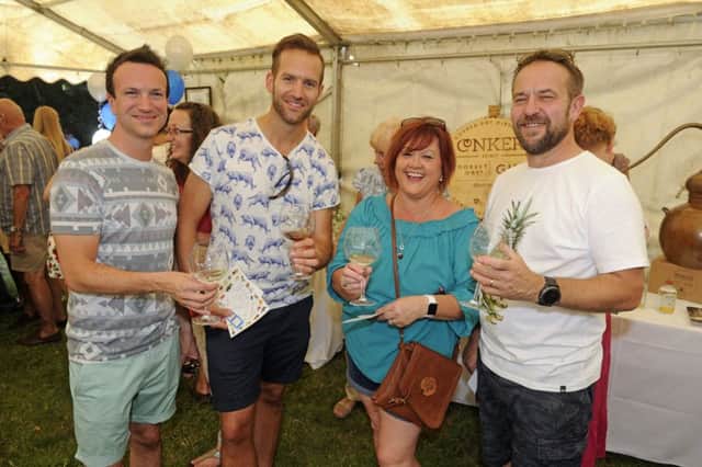 07/07/17 BF
The Denmead Gin Festival. (left to right), Anthony Tivey, Steve Powell, Kathy and Tom Tucker.
Picture Ian Hargreaves (170756-1) PPP-170907-130242006