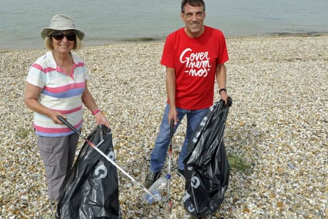 Vicky Bateman and Lewis Aliagh at the Lee-on-the-Solent beach clean-up Picture: Ian Hargreaves (170754-1)