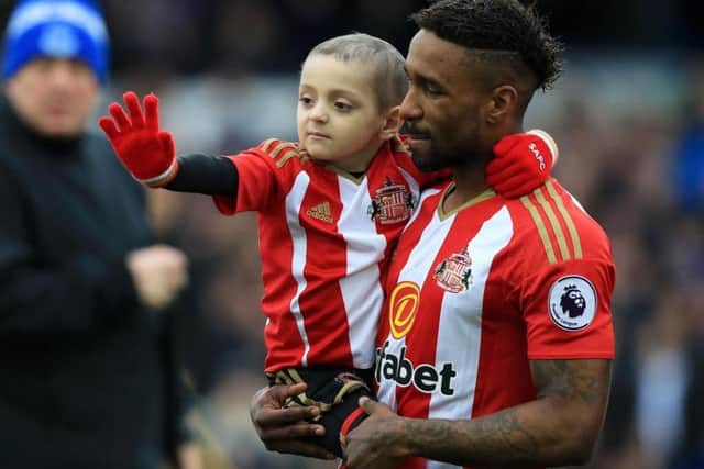 Bradley Lowery and Jermain Defoe. Picture: Peter Byrne/PA Wire