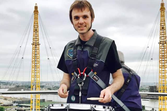 Drummer Nathan Hill on the roof of the O2 Arena  Picture: Talie Rose Eigeland