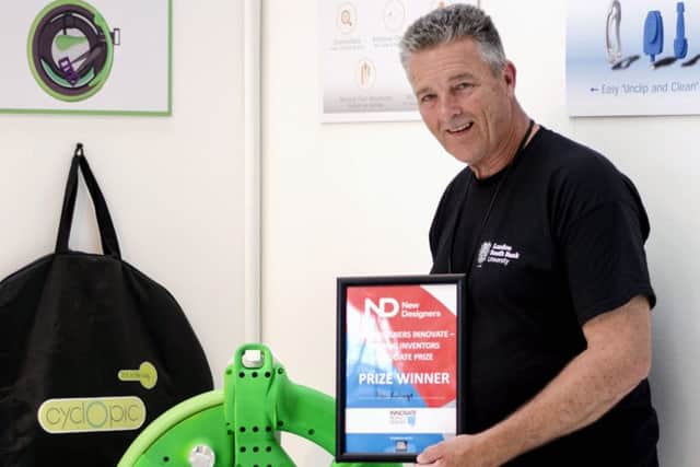 Alan Rallings with his folding bike invention