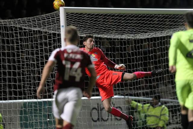 Luke McGee in action for Peterborough last season Picture: Sharon Lucey