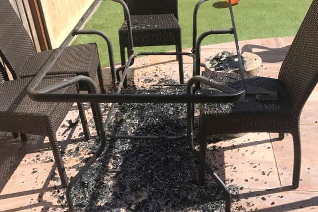 The damaged Asda glass-topped table