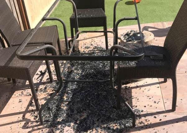 The damaged Asda glass-topped table