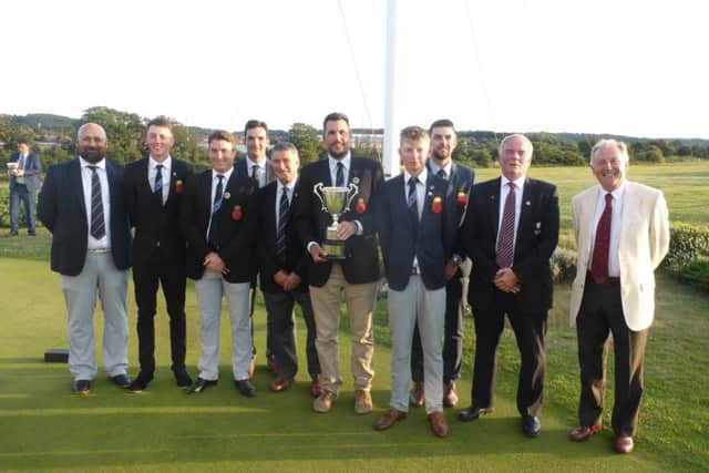 Martin Young, centre, with the winning Hampshire contingent Picture: David Wheeler