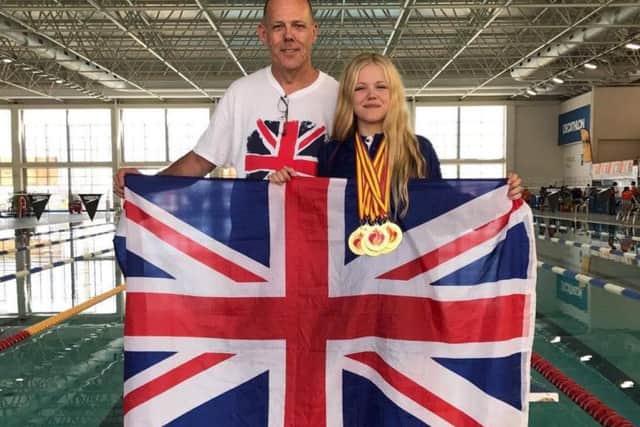 Nicole Mackenzie with her dad David (left) at the recent World Transplant Games.