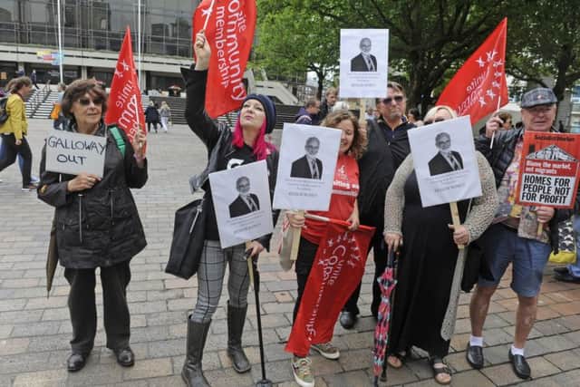 Protesters call for the resignation of Councillor Colin Galloway