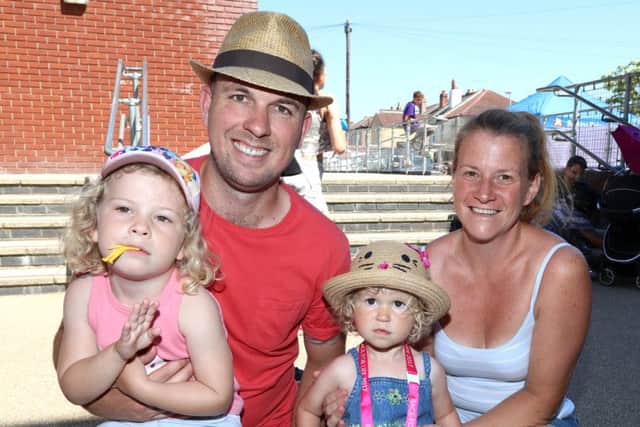 Matilda, three, with Dan Gall, Faye and Bridgett, one, at Milton Park summer fair
