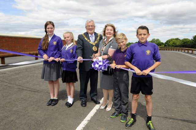 The opening of the bridge with  from left to right, Brooke Harding (11), Ruby Jeans (11), the Mayor of Winchester, Councillor David McLean together with Councillor Elaine Shimbart, Mayor of Havant, Tyler Hardie (11), and Harrison Sturley (11)