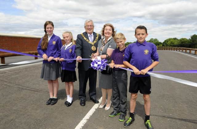 The opening of the bridge with  from left to right, Brooke Harding (11), Ruby Jeans (11), the Mayor of Winchester, Councillor David McLean together with Councillor Elaine Shimbart, Mayor of Havant, Tyler Hardie (11), and Harrison Sturley (11)