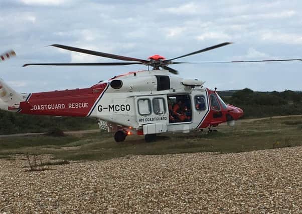 The search and rescue helicopter involved in rescuing five people at Stokes Bay. Picture: Hill Head Coastguard