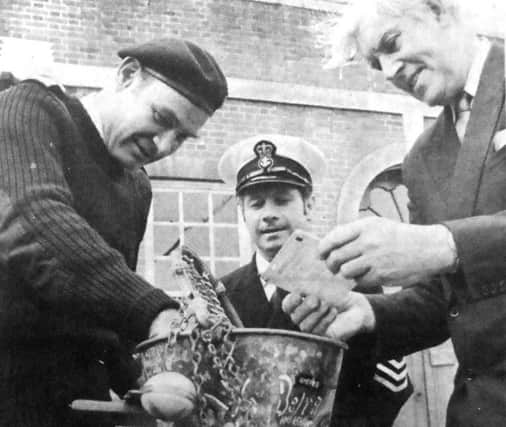jpns-15-07-17 retro july 2017

bucket - Examining the bucket after it had been presented to the Victory Museum, Portsmouth, are (left to right) Admiral Sir Terence Lewin, Chief PO Bill Rosewell, and Captain AJ Pack, the director of Portsmouth RN Museum