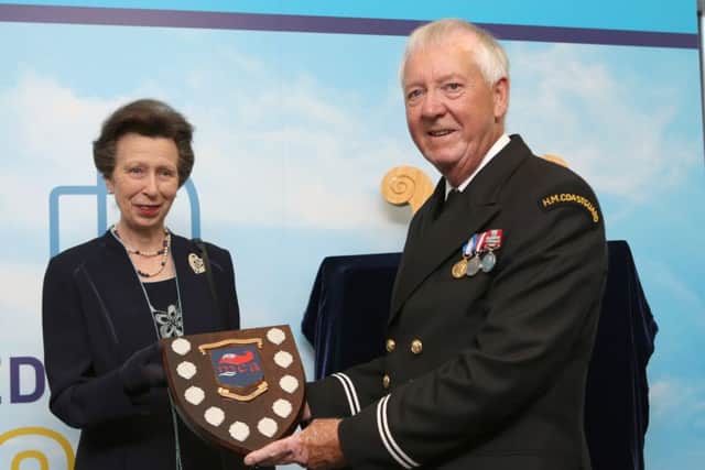 The Princess Royal presenting a Volunteer of the Year award to Mike Saunders