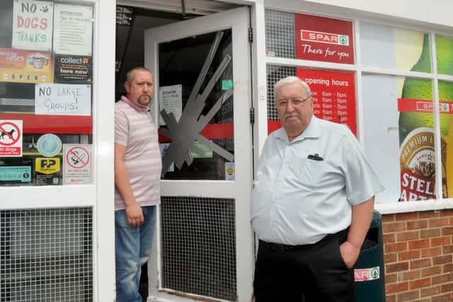 12/7/2017 (LC)Stuart Toms, co-owner of the Spar shop in Fort Cumberland Road, Portsmouth, which has recently been hit by an escalation in petty youth thefts from kids in the area over the last six months. Pictured is: (l-r) Stuart Toms (40) and his dad Howard Toms (74).Picture: Sarah Standing (170886-5098) PPP-170714-163918001