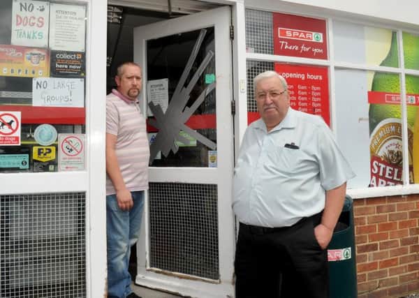 12/7/2017 (LC)

Stuart Toms, co-owner of the Spar shop in Fort Cumberland Road, Portsmouth, which has recently been hit by an escalation in petty youth thefts from kids in the area over the last six months. 

Pictured is: (l-r) Stuart Toms (40) and his dad Howard Toms (74).

Picture: Sarah Standing (170886-5098) PPP-170714-163918001
