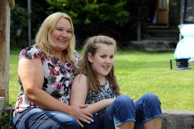 Scarlett Winter, 11, with her mum Stacy Winter, 43, from Farlington. PPicture by:  Malcolm Wells (170714-4011)