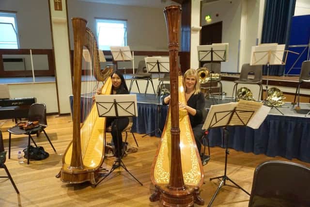 Harpists Ruby Aspinall, left, and Kate Ham