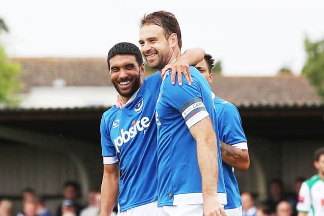 Danny Rosse, left, with goalscorer Brett Pitman Picture: Joe Pepler