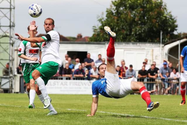Brett Pitman pulls off an overhead kick for Pompey at Bognor. Picture: Joe Pepler