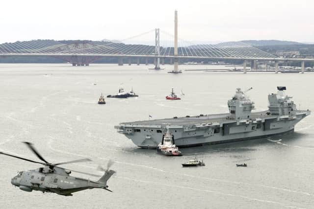 The aircraft carrier left from her dock in Rosyth last month    IMAGE: L(Phot) Caz Davies