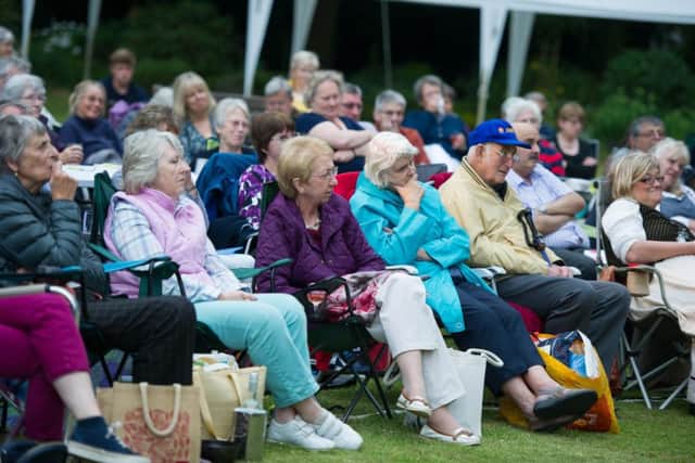 The audience engrossed in All's Well That Ends Well
