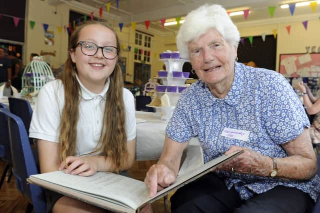 Ruby Mills (11), meets ninety-one year old Beryl Dunkerley who was a pupil at the school in 1935 
Picture Ian Hargreaves  (170925-1)