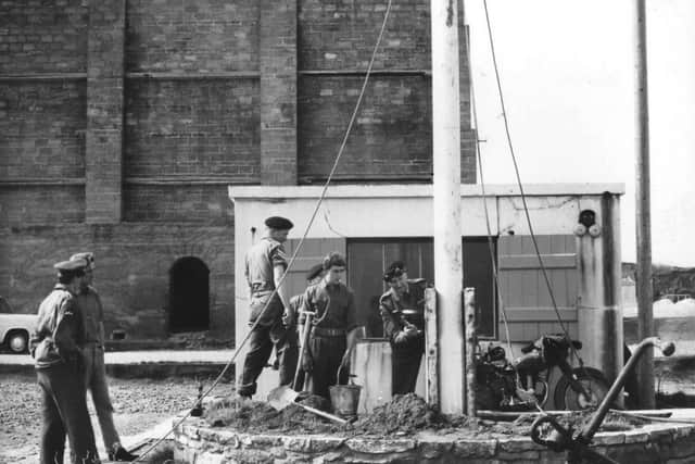 Men  from 115 Hampshire Fortress RE Reg TVAR at work on a Channel Islands jetty in the early 1960s.