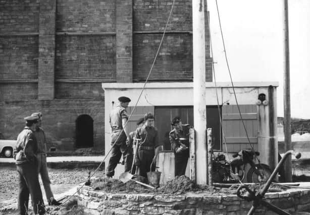 Men  from 115 Hampshire Fortress RE Reg TVAR at work on a Channel Islands jetty in the early 1960s.