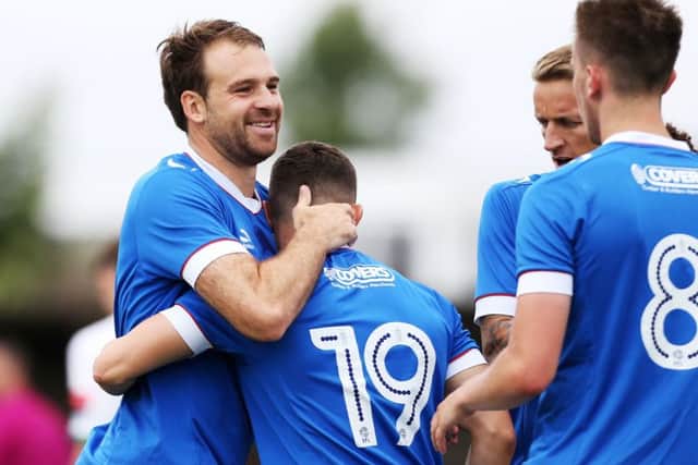 Brett Pitman thanks Conor Chaplin for setting up his opener at Bognor on Saturday Picture: Joe Pepler