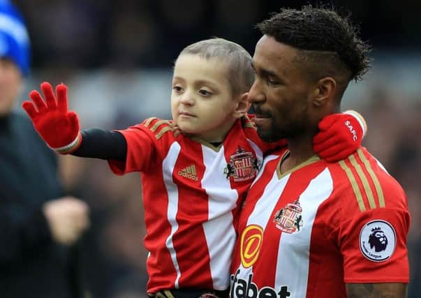 Bradley Lowery and Jermain Defoe. Picture: Peter Byrne/PA Wire