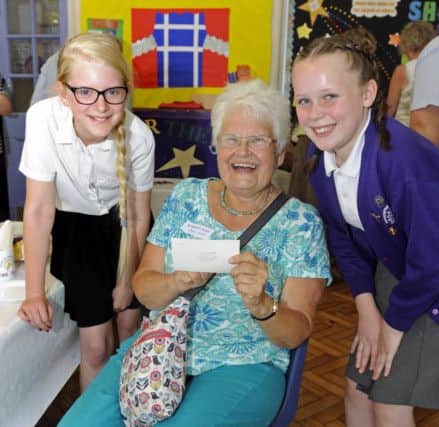 Former pupil Wendy Moore with Sylvie Broadbent -Smith,  and Katelyn Ingram  both eleven