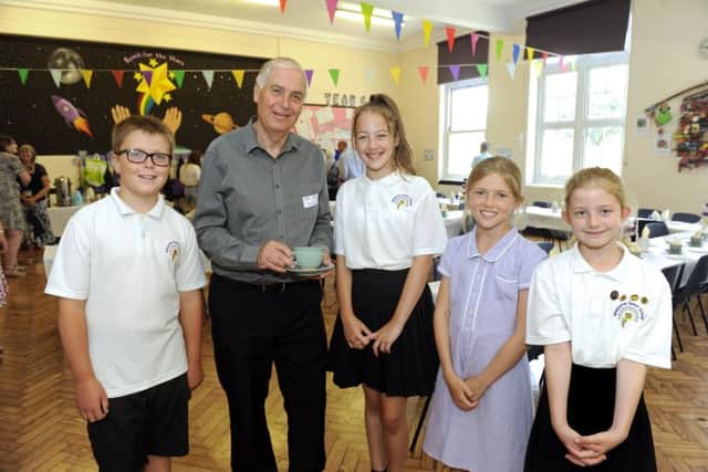 Derek Gleed who was a pupil in the 1950's meets (left to right), Jackson Richards, Jessica Shillngford, Dulcie Davis, and Isabelle Bailey all ten