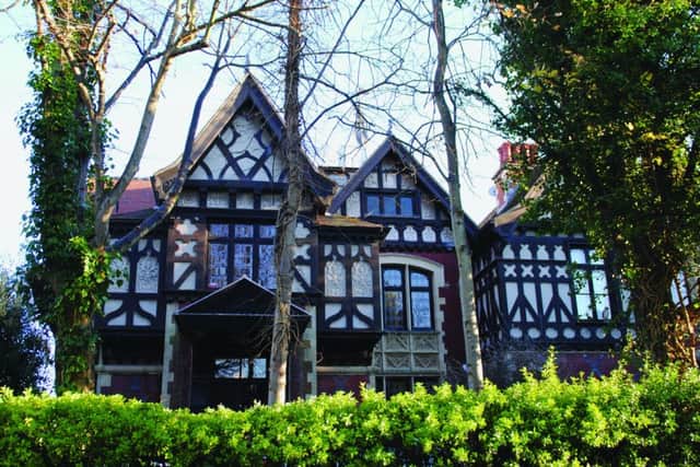 Brankesmere House, Queens Crescent, Southsea, 1896: built in 1895-96, apparently replacing two Thomas Ellis Owen villas. The style is a mixture of Jacobean, Tyrolean and French. 
It was built for John Brickwood, the owner of Brickwoods Brewery and pub chain, who was also the first chairman of Portsmouth Football Club from 1898. His friend Dr Arthur Conan Doyle had played in goal for the amateur club that preceded it.
The architect was another friend and fellow Freemason, AE Cogswell, also chief architect for many of the mock-Tudor style of Brickwoods pubs in the city.