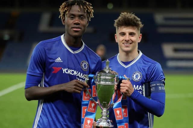 Chelsea's Trevoh Chalobah, left, and Mason Mount with the FA Youth Cup trophy