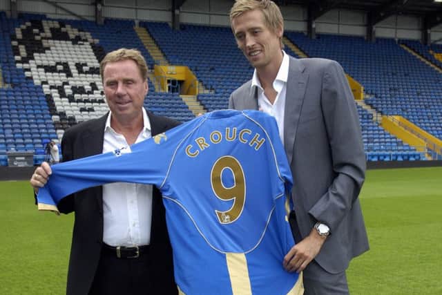 Peter Crouch signing for Pompey in 2008 with then boss Harry Redknapp