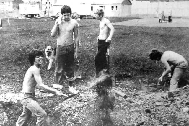 jpns-22-07-17 retro July 2017
Adventure park - These boys were digging holes to install one of the constructions which will be built in the adventure playground at Arundel Street, Portsmouth (0739-2)