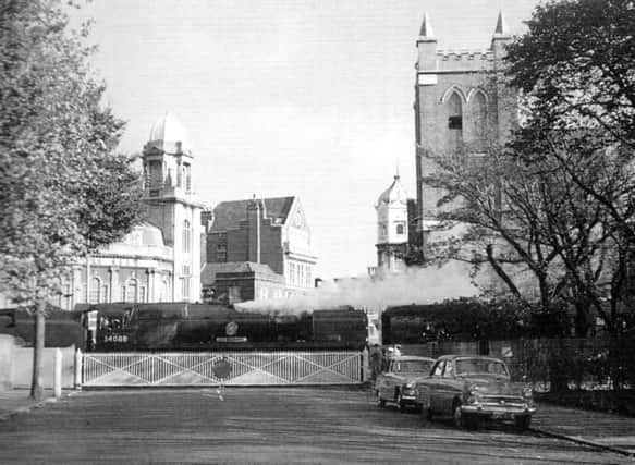 Here we see the Congregational Church from across the  dockyard branch level crossing and see the  steeple has been removed.