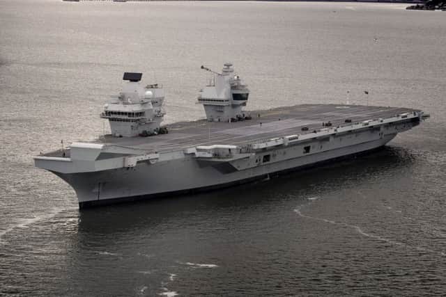HMS Queen Elizabeth leaving the Rosyth dockyard near Edinburgh to begin her sea trials. Picture: Royal Navy/MoD Crown Copyright/PA Wire
