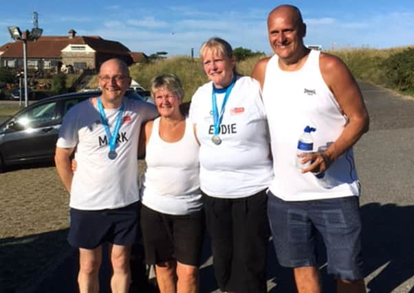 L-R: Mark Baulch, Jilly Russell, Eddie Bell and Mark Smithard  completed the last eight miles of theTrek the Night challenge. From: Peter Denton.