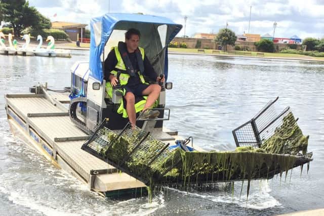 The Mobitrac device clears algae from Canoe Lake