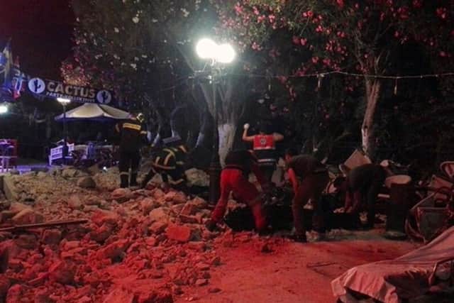 Firefighters and rescuers clear a road after an earthquake on the Greek island of Kos Picture: (Kostoday.gr via AP)/Press Association