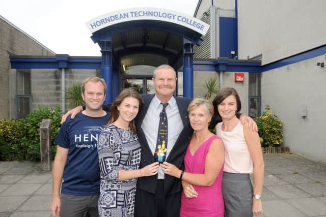 Julian Brown (60) with his family (l-r) son-in-law Paul Saunders (29), daughter Sara Saunders (28), wife Karen Brown (60) and daughter Kate Brown (31).Picture: Sarah Standing (170958-5461) PPP-170721-151239001