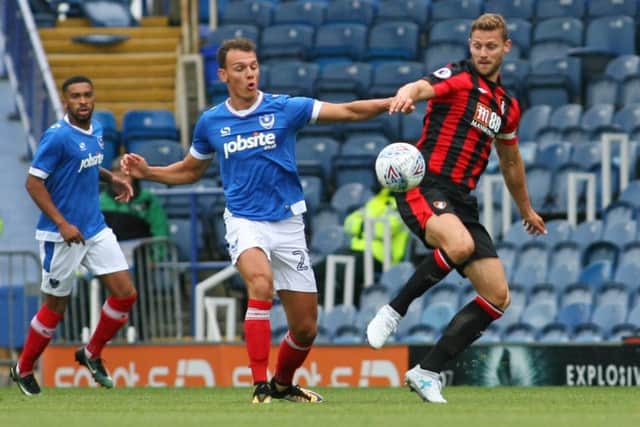 Kal Naismith in action for Pompey against Bournemouth Pictures: Shaun Boggust