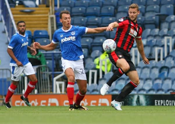 Kal Naismith in action for Pompey against Bournemouth Pictures: Shaun Boggust