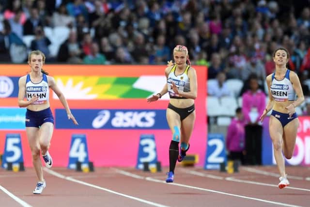 Olivia Breen, right, competing with Sophie Hahn, left, and Germany's Lindy Ave in the Women's 100m T38 final in London