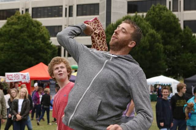 Tom Beeson throwing a welly Picture: Habibur Rahman (170915-94)
