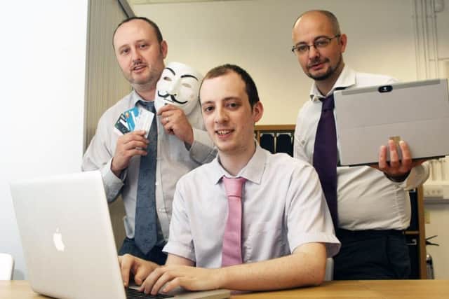 Nigel Morgan and Dave Cutts, with centre, Oli Poole