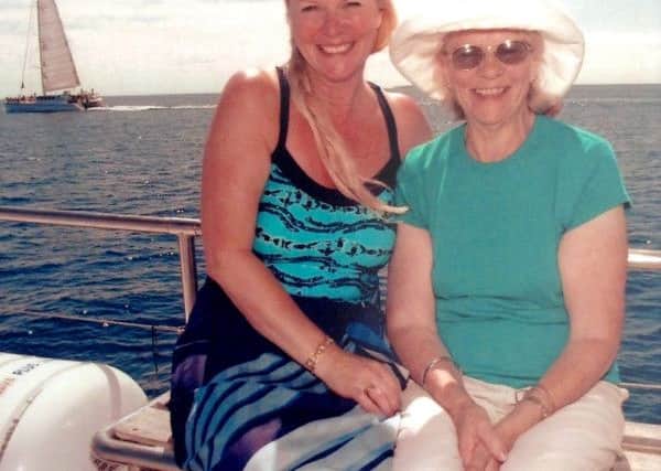 Jacquie Williams, left, with her mother Dereen, on holiday about 10 years ago